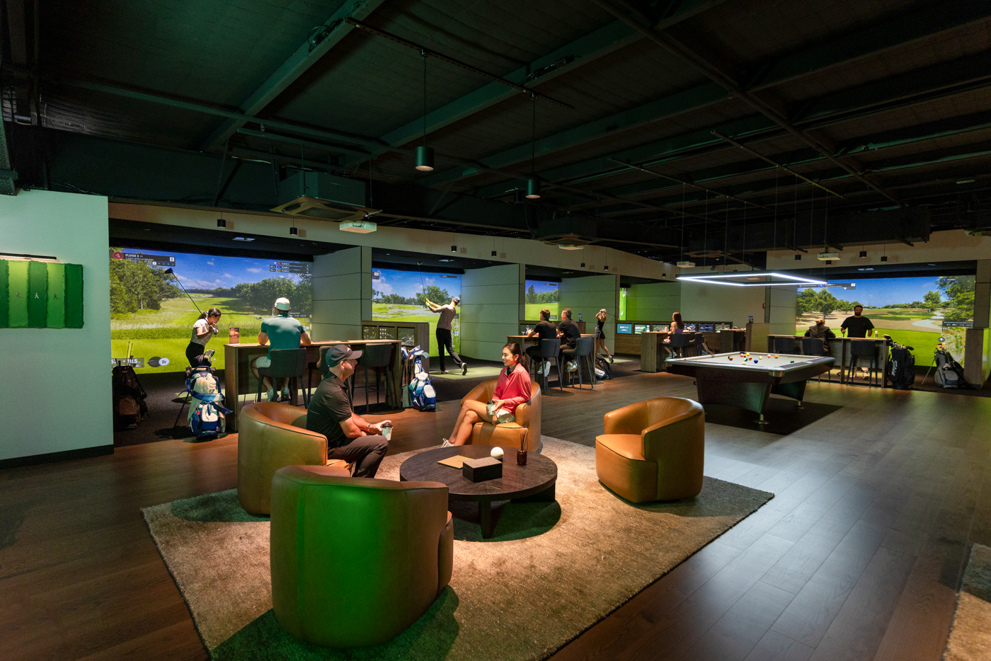The Reserve members lounge and simulator bays at GolfSpace